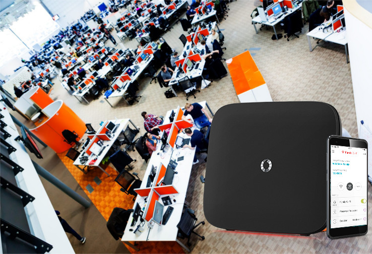 Vodafone call centre stock overhead with router composite