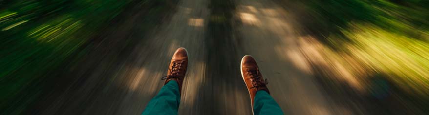 feet in focus with background rushing past very fast