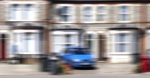 blurry photo of row of houses