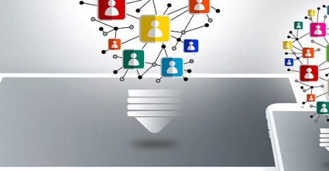 digital image of smart devices with colourful networks in the shape of lightbulbs